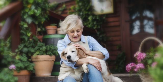 A woman with metastatic pancreatic cancer with her dog.