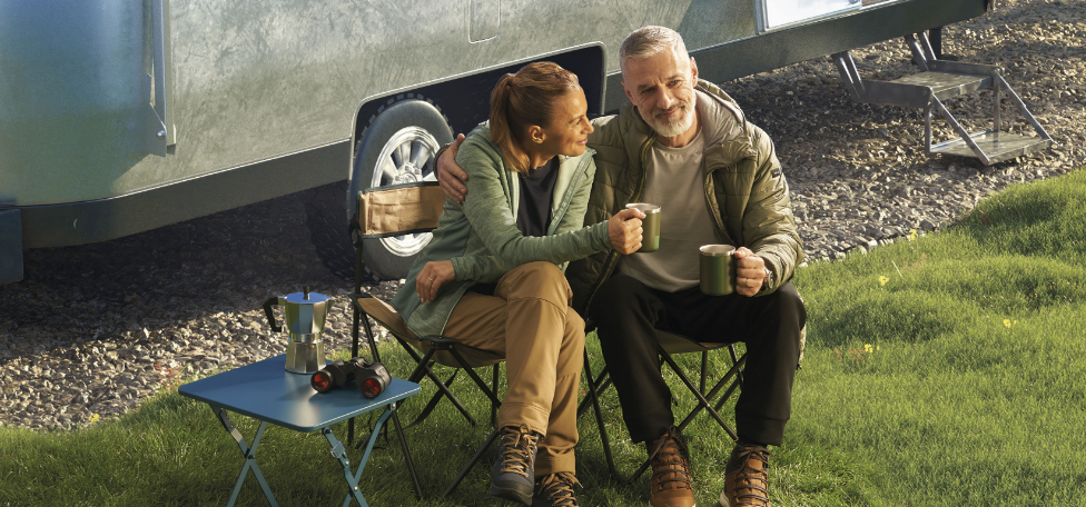 A couple affected by metastatic pancreatic cancer having coffee.